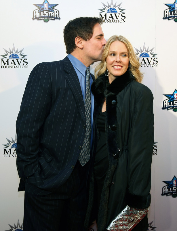 <strong> Mark Cuban<em> kisses his wife</em> Tiffany Cuban </strong>on the red carpet during a NBA Tip-Off Party as part of the 2010 NBA All-Star Weekend on February 11, 2010 at the Majestic Theater in Dallas, Texas. <strong><em> photo appears courtesy  of NBAE/Getty Images/</em> </strong> David Sherman  .........