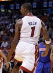 Miami Heat forward Chris Bosh (1) reacts after scoring in the first quarter during a preseason NBA basketball game against the Detroit Pistons in Miami, Tuesday, Oct. 5, 2010. Bosh scored 20 points as the Heat won 105-89. AP Photo/Lynne Sladky .....